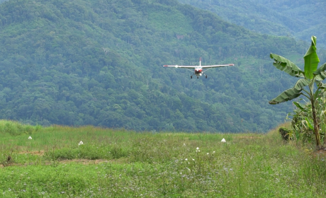 MAF plane landing at Rum airstrip